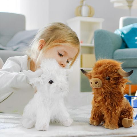 Peluche enfant vache