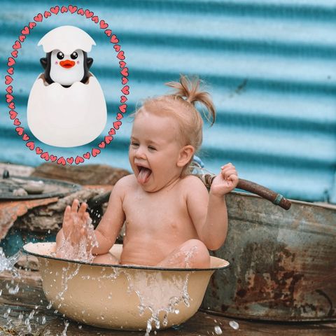 jouet-de-bain-pingouin-arrosoir-douche